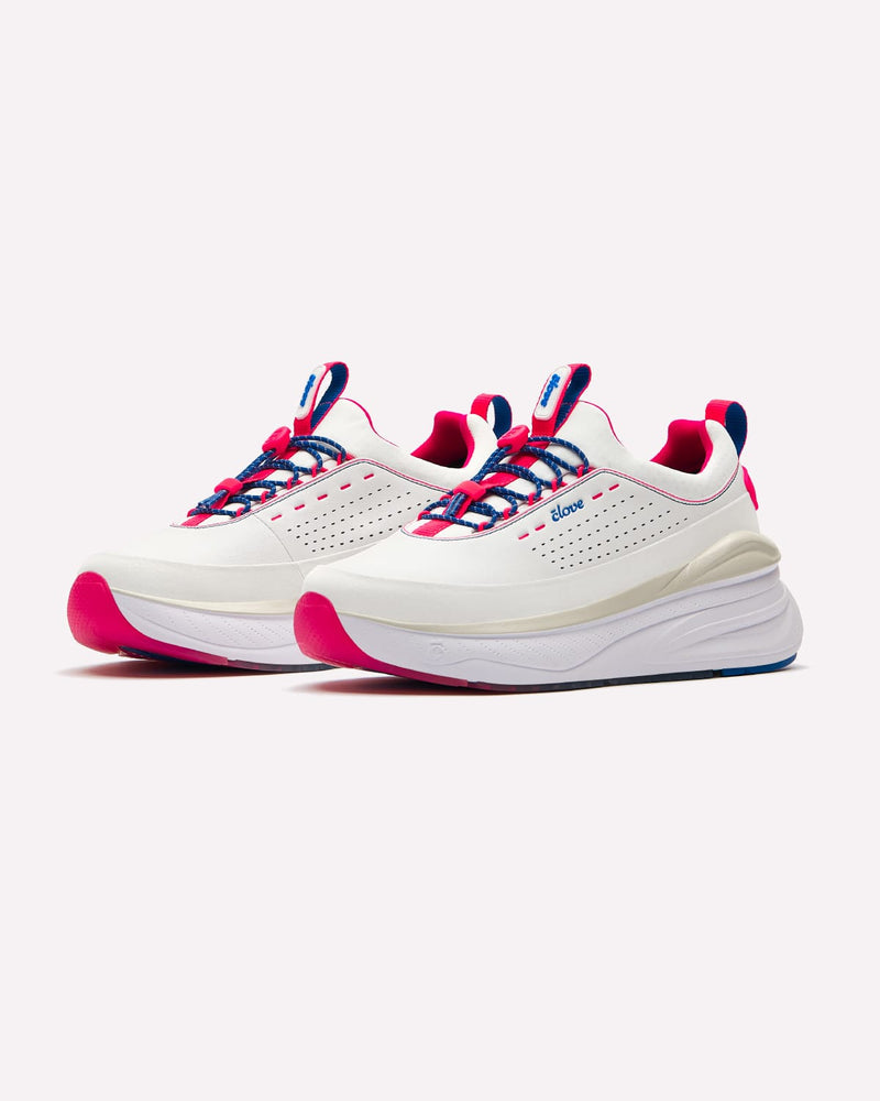 White shoes with pink and blue accents on a white background