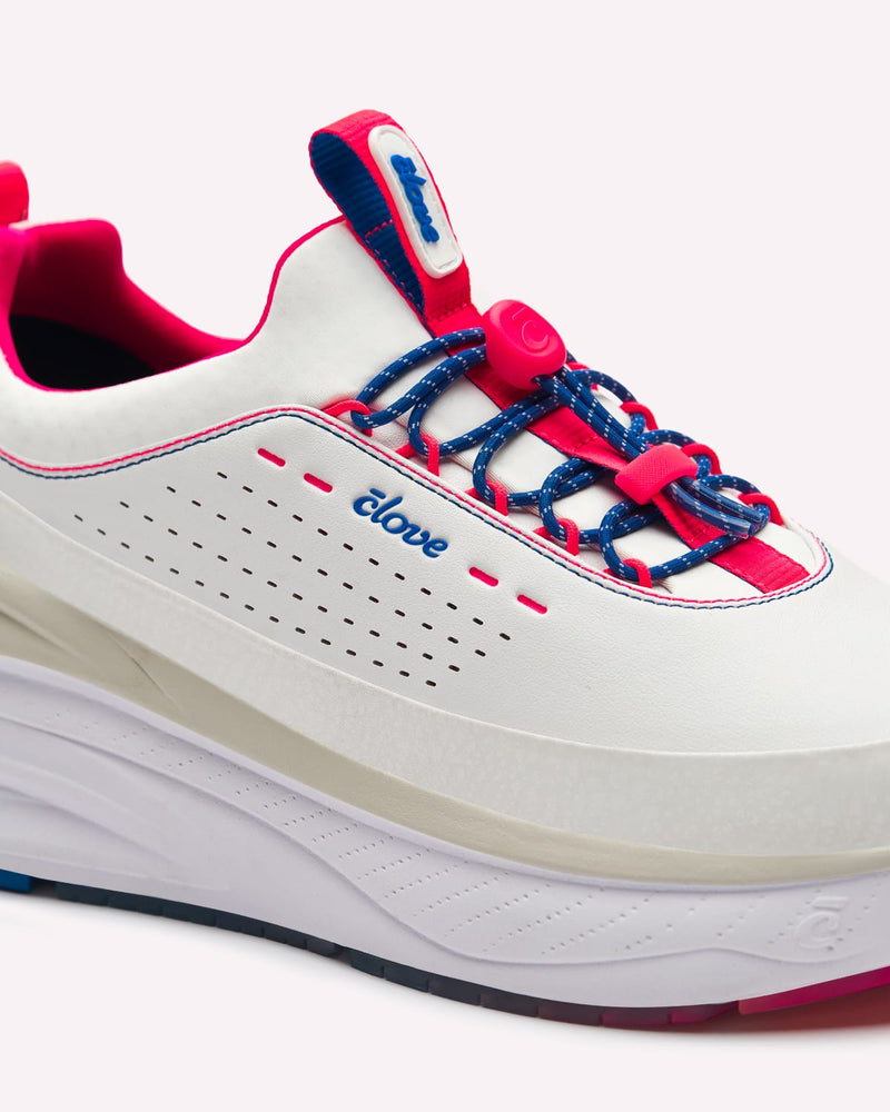White shoe with red and blue accents on a white background