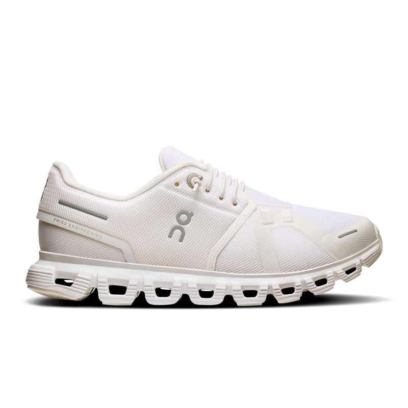 A white ON RUNNING CLOUD 6 athletic shoe with a unique sole designed for cushioning and stability.