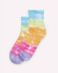 A pair of ankle socks with a pastel tie-dye pattern in blue, green, yellow, pink, and purple, displayed against a light off-white background.